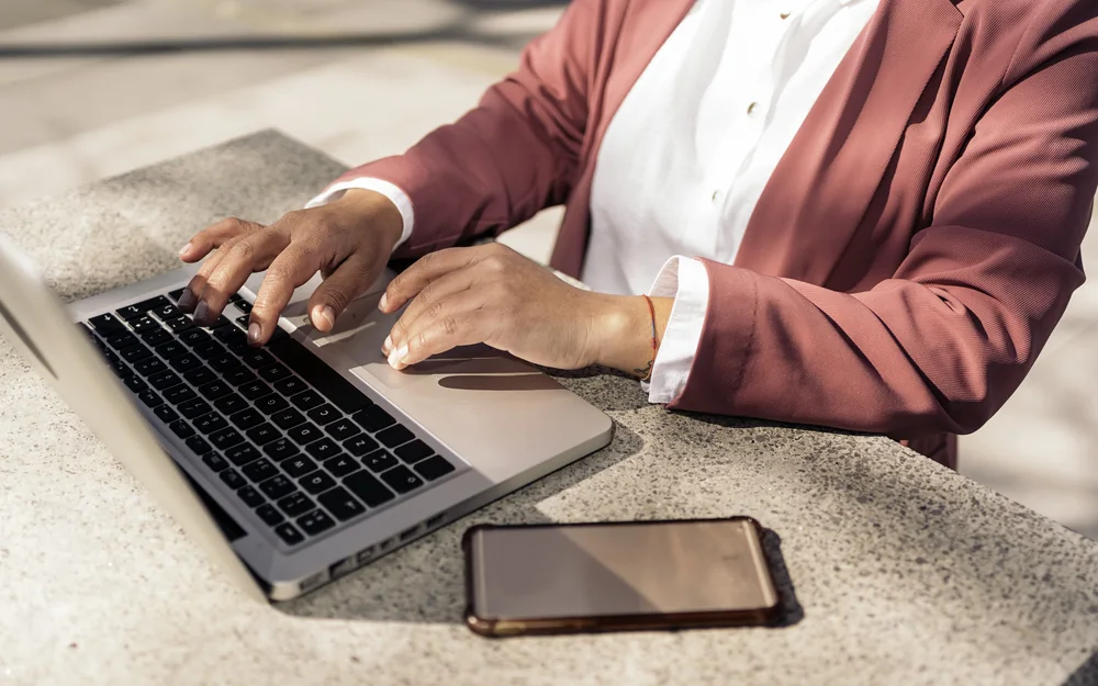 A donor managing her giving on a laptop