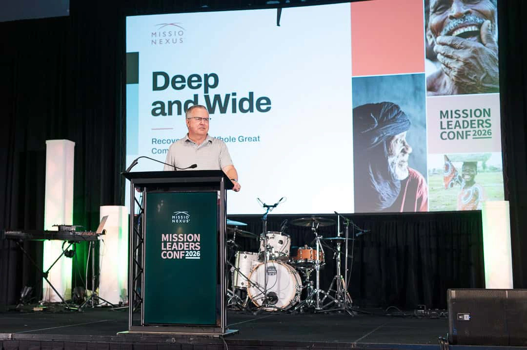 Bob McNabb at the podium under the Deep and Wide keynote slide