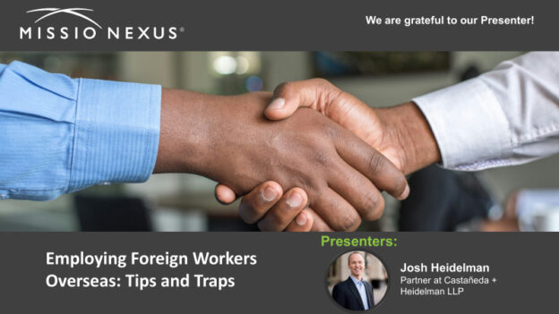 Handshake between two individuals representing international employment collaboration.