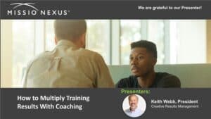 Two men in a coaching session discussing training results.