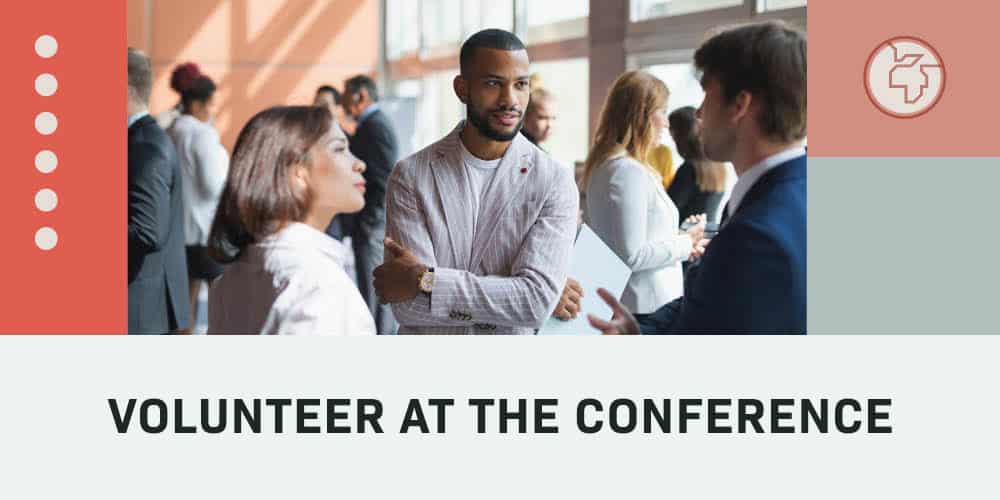 Diverse group of conference volunteers engaging in discussion at Missionexus event.
