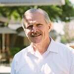 Portrait of a man smiling outdoors, representing Missio Nexus leadership.